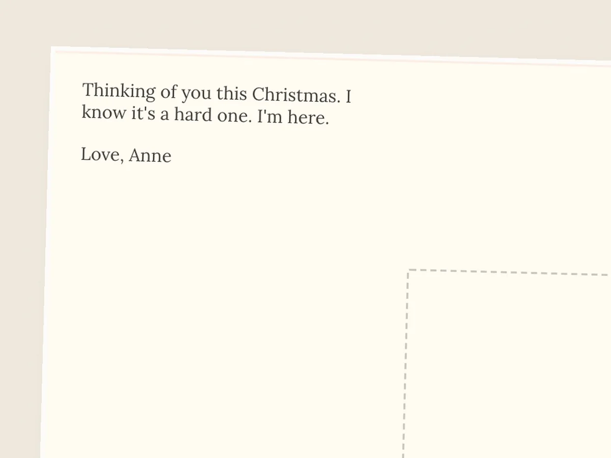 Plain cream postcard back with no stickers: thinking of you this Christmas, I know it's a hard one, I'm here