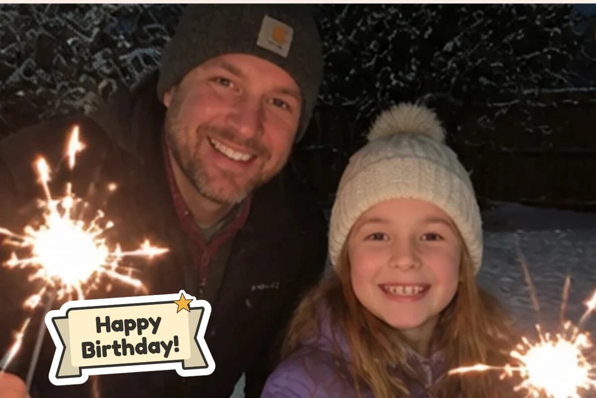 Card front with one photo of a man and a girl holding sparklers in the snow, with a Happy Birthday sticker