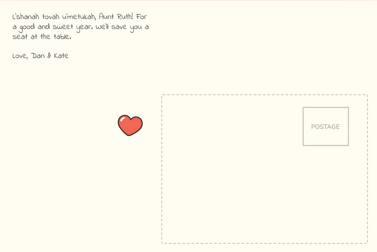 Postcard back with a note reading L'shanah tovah u'metukah, Aunt Ruth, a red heart sticker and the address box