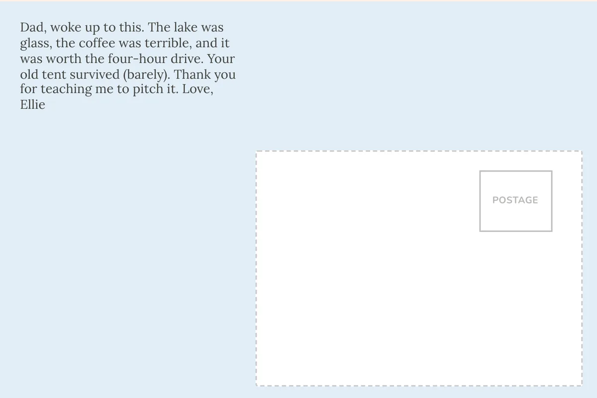 Postcard back with a message to Dad in a print font on pale blue